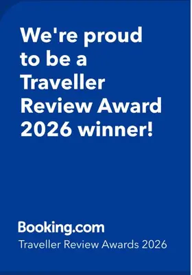 a blue sign that says were proud to be a traveller review award winner at Beautiful flat Nice - Palais Meyerbeer at 2min beach Negresco in Nice