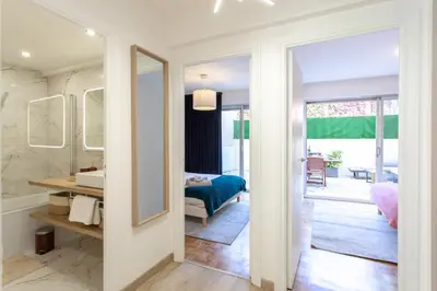 a bathroom with a sink and a mirror at 86m- Spacious 3 room apartment with large terrace in Villefranche-sur-Mer