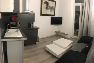 a small kitchen with a sink and a microwave at Superbe appartement en plein centre ville de Nice! in Nice