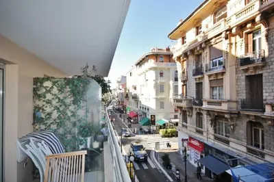 a view of a city street from a balcony at Le Palais de Med Studio Promenade des Anglais in Nice