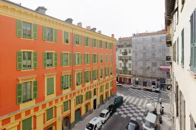 an aerial view of a city street with buildings at Rue Fodere location Port area in Nice
