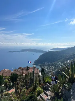 a view of a city and the ocean from a mountain at Évasion Authentique à Èze, avec vue Mer in Èze