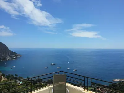 a view of a body of water with boats in it at Villa Moana in Èze