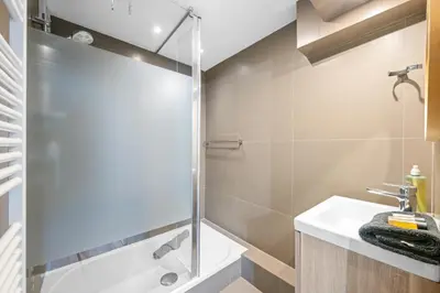 a bathroom with a shower and a sink at Spacieux Loft & Central- Vieux Nice in Nice