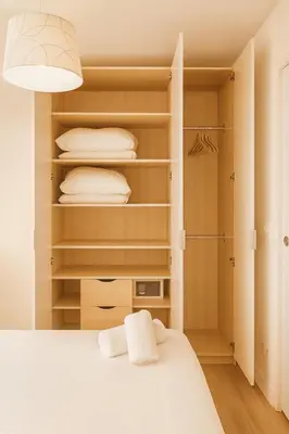 a bedroom with a bed and a closet at Cassini 2 Pers Hyper Center WiFi in Nice