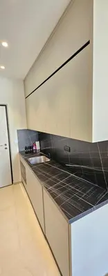 a kitchen with a sink and a counter top at Studio Nice Plage Luxe in Nice