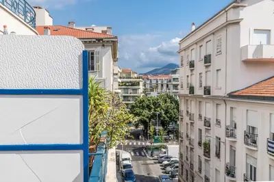 a view of a city street with buildings at Studio with large terrace sea view 4th floor in Nice