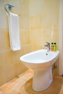 a bathroom with a white sink and a shower at Promenade 2 Pers Vista Mare WiFi AC in Nice