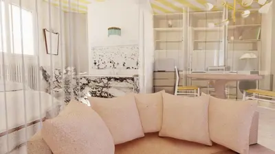 a living room with a couch and a table at Penthouse avec terrasses panoramiques in Nice