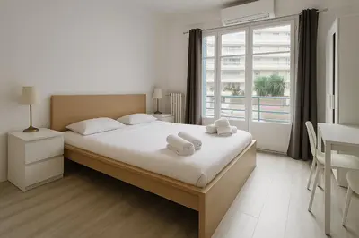 a bedroom with a bed with two towels on it at Stella Monte 3 AC WiFi 2 Pers in Nice