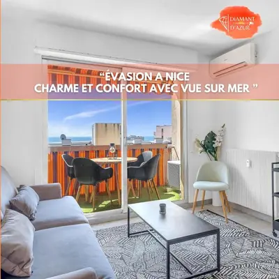 a living room with a couch and a table at Bel appartement vue mer proche de la promenade des anglais in Nice