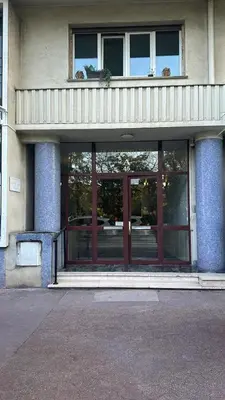 a building with large glass doors and a balcony at 2 Bedroom Ocean view Apartment in Nice