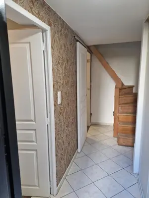 a bedroom with a bed and a large window at Appartement 4 pièces - gare Nice riquier in Nice