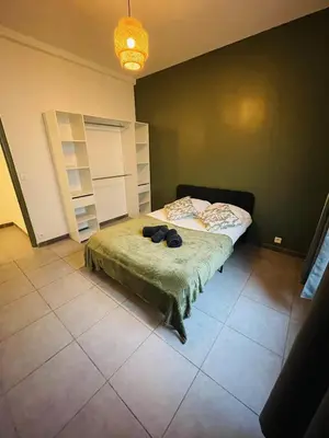 a bedroom with a bed in a room at Appartement Californie Beach in Nice