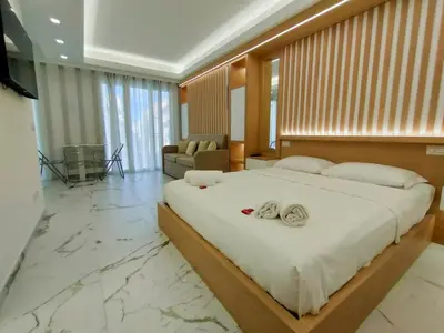 a bedroom with a large bed with towels on it at France 105 Super Centrale 2 Pers WiFi AC in Nice