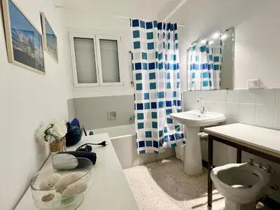 a bathroom with a sink and a toilet and a shower at Terrace and view on all Nice city in Nice