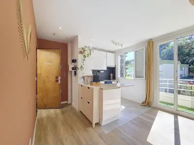 a kitchen with a counter and a sink in it at Studio toit terrasse vue mer Sea View in Nice
