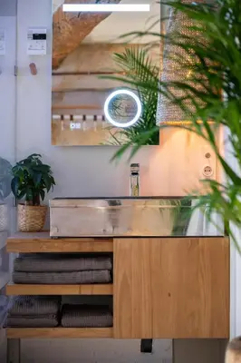 a bathroom with a sink and a mirror at Studio29 in Nice