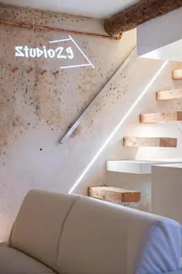 a staircase with a sign on the wall at Studio29 in Nice