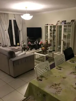 a living room with a couch and a table at Nice port quartier antiquaire in Nice