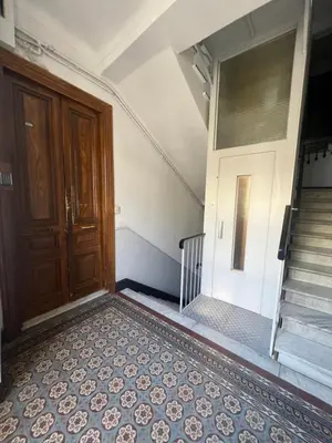 an empty room with a door and a staircase at Studio nel cuore della città in Nice