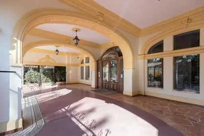 a large room with an archway in a building at Superbe studio Nice hyper centre immeuble standing in Nice
