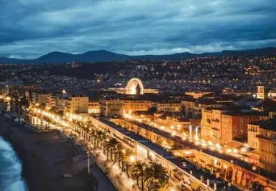 a city lit up at night with street lights at Hyper Centre - Charming duplex - Luxury - Reversible air conditioning - 10 mins from Place MASSENA in Nice