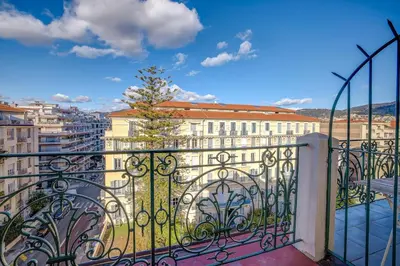 a balcony with a view of a city at Maison Bianchi - Avenue Durante - Downtown Top floor in Nice