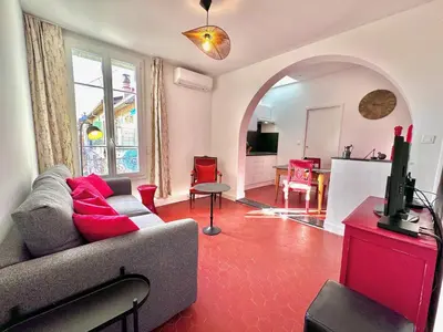 a living room with a couch and a table at ApartHotel Riviera - CLOCHER D'ALEXANDRE - Old Town - Promenade des Anglais in Nice