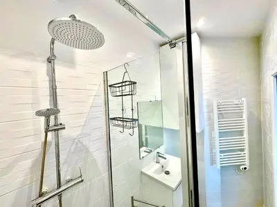 a bathroom with a shower with a toilet and a sink at ApartHotel Riviera - CLOCHER D'ALEXANDRE - Old Town - Promenade des Anglais in Nice