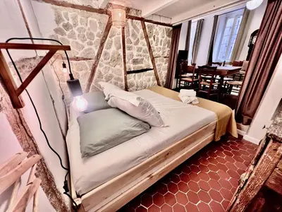 a bedroom with a bed in a room at ApartHotel Riviera - MAISON DU CHATEAU - Old town - Promenade des Anglais in Nice