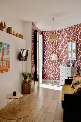 a living room with a couch and a table at Studio with Big terrace full center with air conditioning in Nice