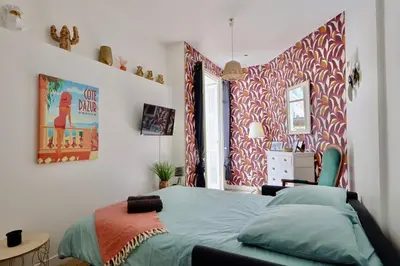 a bedroom with a bed and a window at Studio with Big terrace full center with air conditioning in Nice