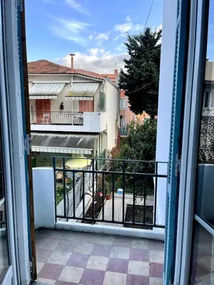 a view from the balcony of a building at Joli 2 pièces avec terrasse, proche mer in Nice