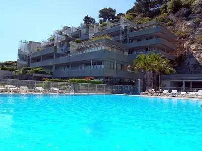 a large swimming pool in front of a building at Appartement Zen Costa Plana in Cap d'Ail