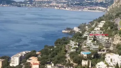arial view of a city and the water at Appartement Zen Costa Plana in Cap d'Ail