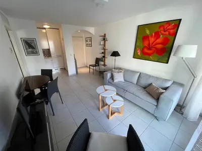 a living room with a couch and a table at Nice Massena 2 rooms in Nice
