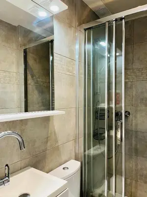 a bathroom with a shower and a toilet and a sink at Charmant studio en plein coeur de Nice in Nice