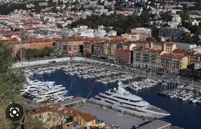 an aerial view of a marina with many boats at Lovely cozy studio in Nice