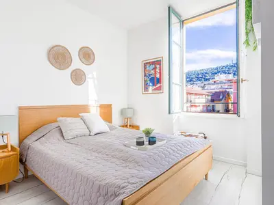 a living room with a couch and a table at Apartment Le Palais du Vieux Port by Interhome in Nice