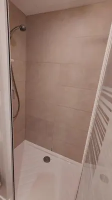 a shower with a glass door in a bathroom at Beach Proximity in Historic Nice, Your Perfect 2 Room Rental in Nice