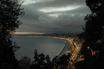 a view of a beach on a cloudy day at Azur BnB in Nice