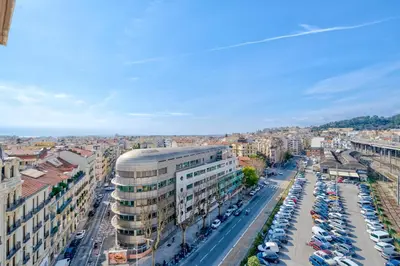an aerial view of a city with cars parked at Studio hypercentre gare in Nice