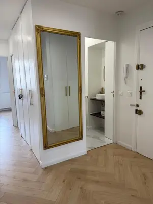 a mirror on a wall in a room at Beautiful 3 rooms, Carré d 'Or in Nice
