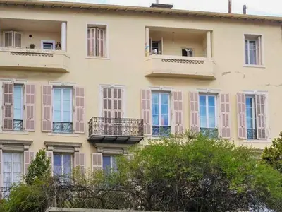 a large building with windows and balconies on it at Barla 1 - a cosy one bedroom apartment in Nice in Nice
