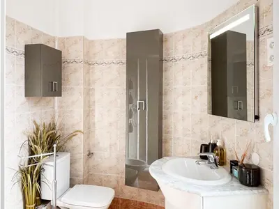a bathroom with a sink and a toilet at #12 1BDR Joffre, Central 5min from Old Town AC & WIFI in Nice