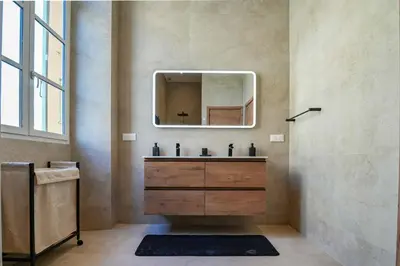 a bathroom with a sink and a mirror at Massena Infinity in Nice