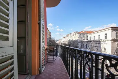 a balcony of a building with a view of a city at Massena Infinity in Nice