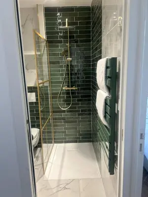 a bathroom with a shower with a glass door at MOON - 35 in Nice