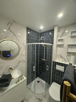 a bathroom with a shower and a toilet and a sink at MOON - 45 in Nice